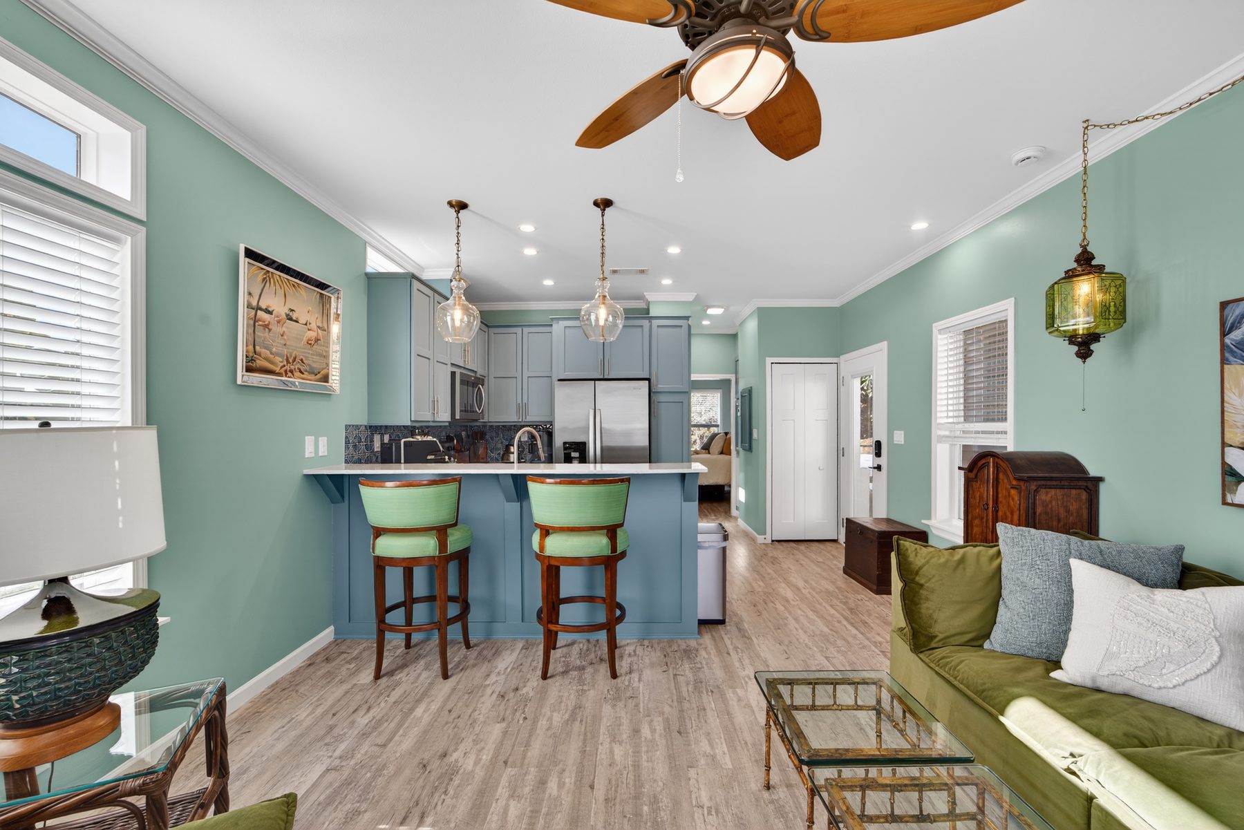 View from living room through to kitchen and front entry
