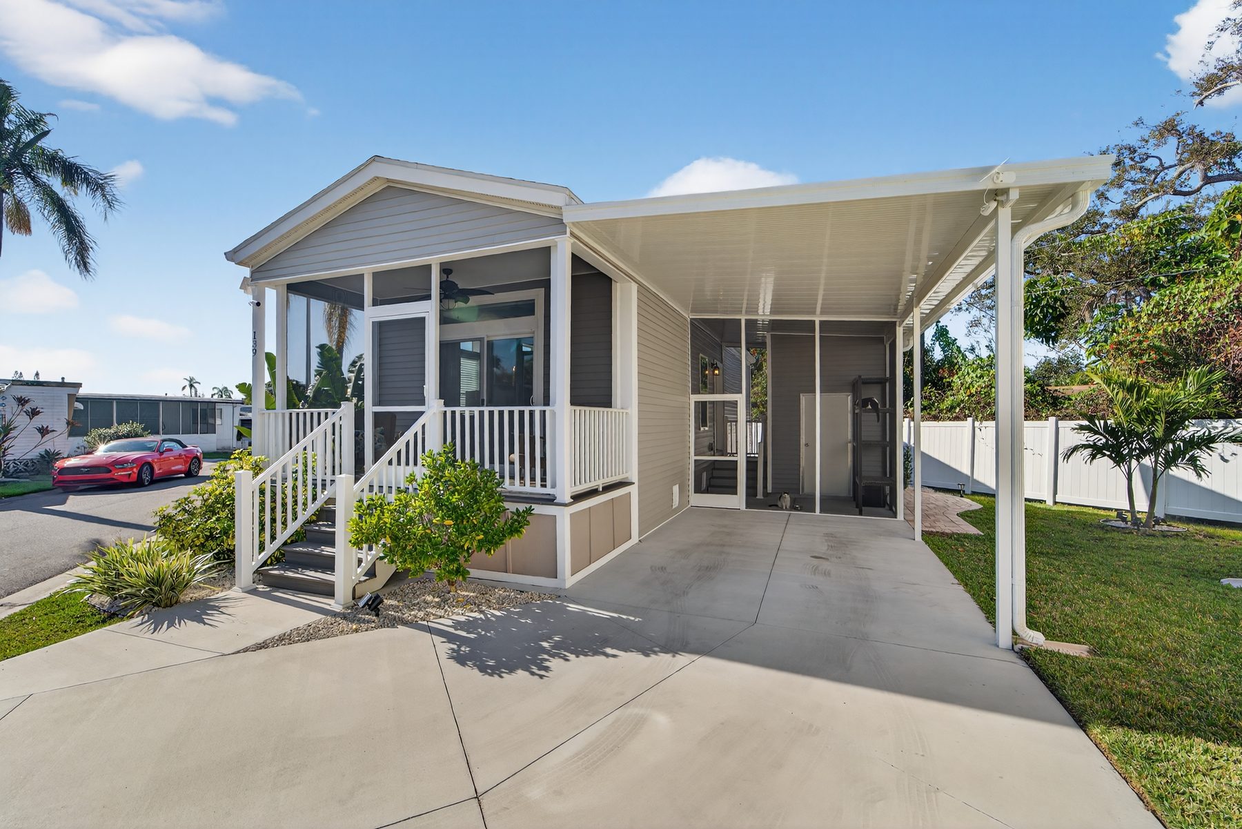 Front exterior of the cottage with porch and carport
